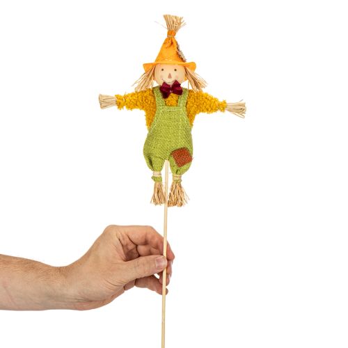 Artículo Figura decorativa de espantapájaros sobre un palo para manualidades y plantas, 60 cm.